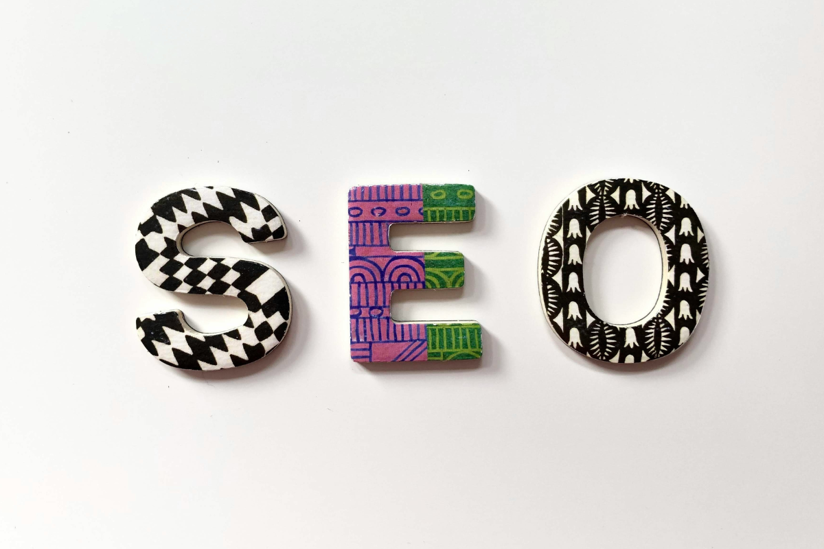 The letters SEO are against a white background. They each have a different design pattern on them.